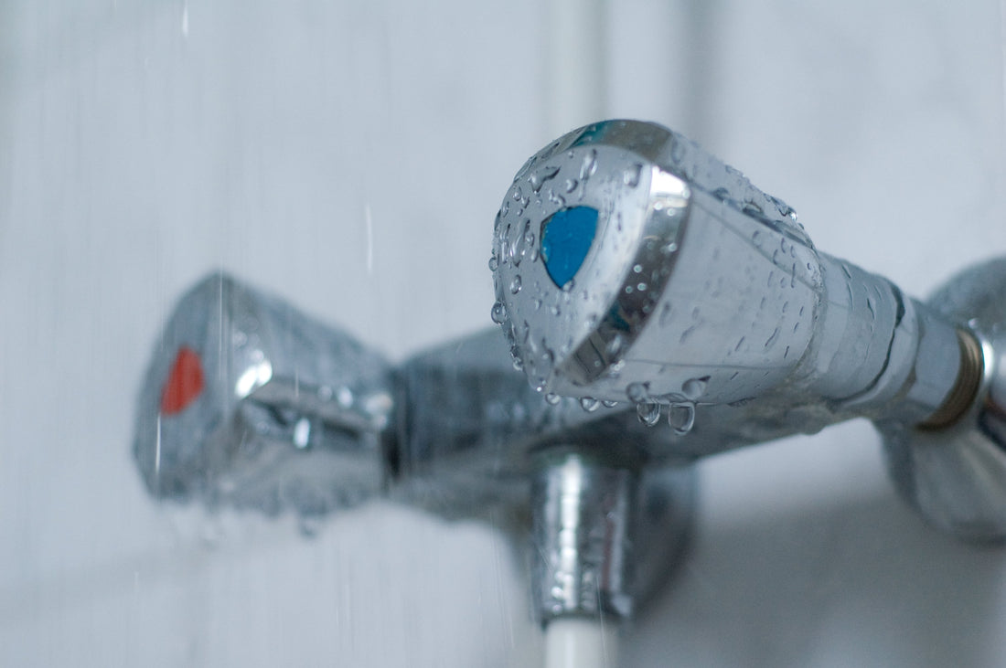 Hot and cold shower taps